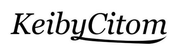 Text logo design featuring 'KeibyCitom' in stylized italic font with decorative serifs on white background.