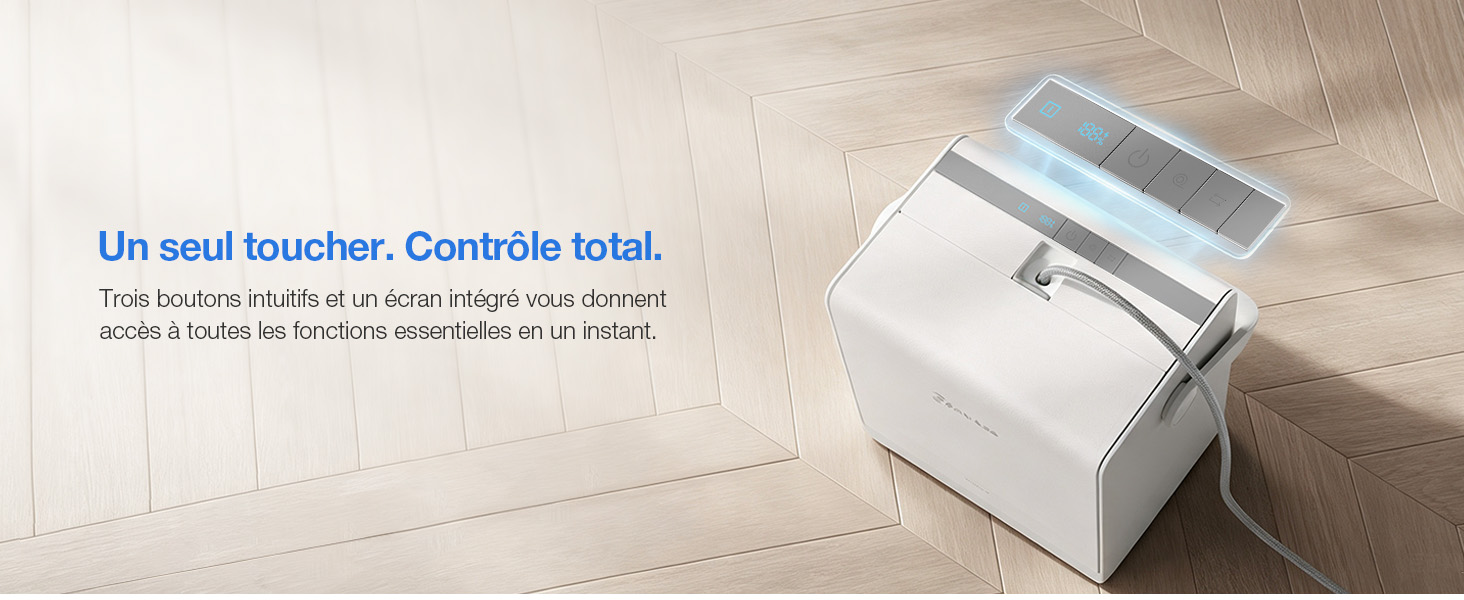 Le texte se lit comme suit : « Un outil toucher. Total fiable. » Distributeur de serviettes en papier compact blanc avec technologie de capteur affiché sur une surface en bois avec description du produit ci-dessous.