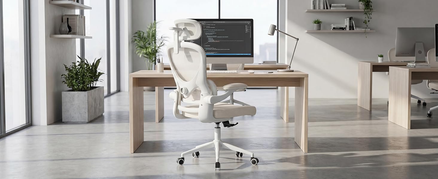 Modern minimalist home office interior featuring white ergonomic office chair at wooden desk with potted plant, pendant lights, and contemporary furnishings.