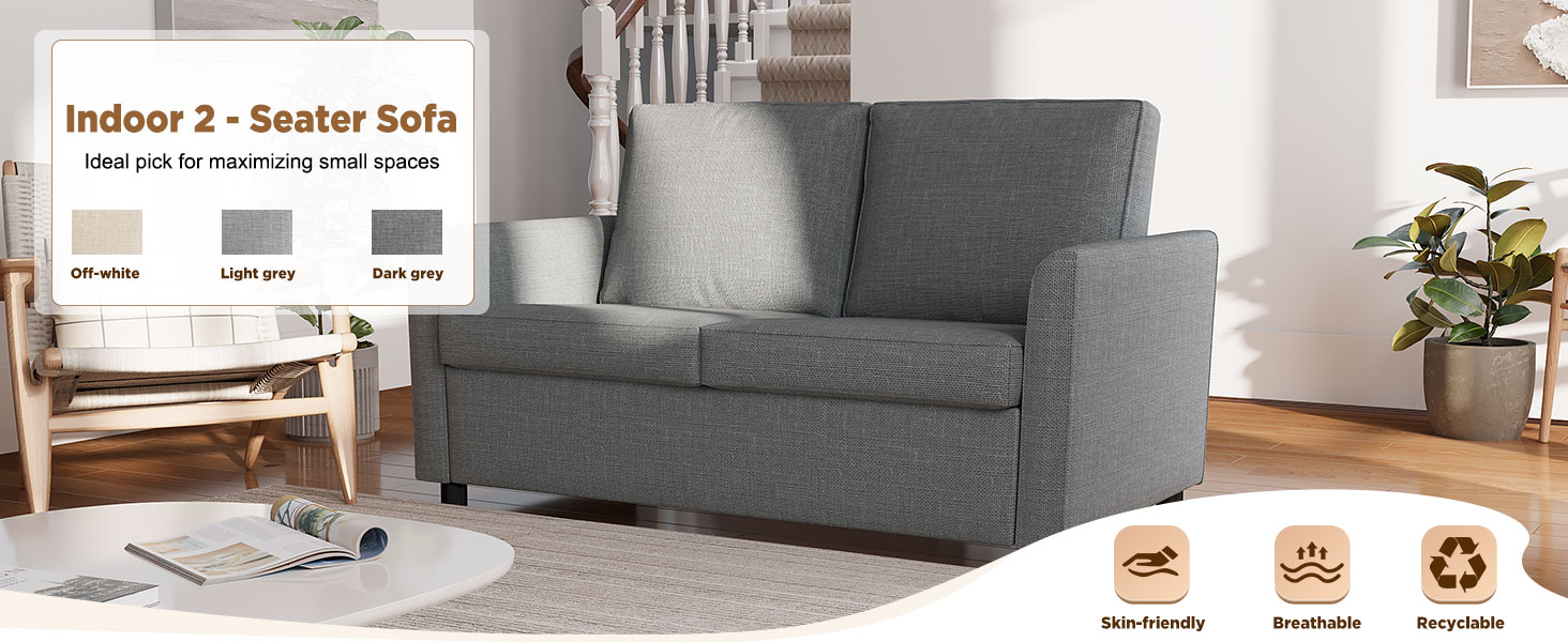 Text reads 'Indoor 2 - Seater Sofa'. Shows grey two-seater sofa in room setting with hardwood floors and decorative plant.