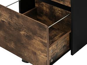 Close-up of a wooden drawer with distressed dark brown finish, showing metal sliding rails and black frame construction.