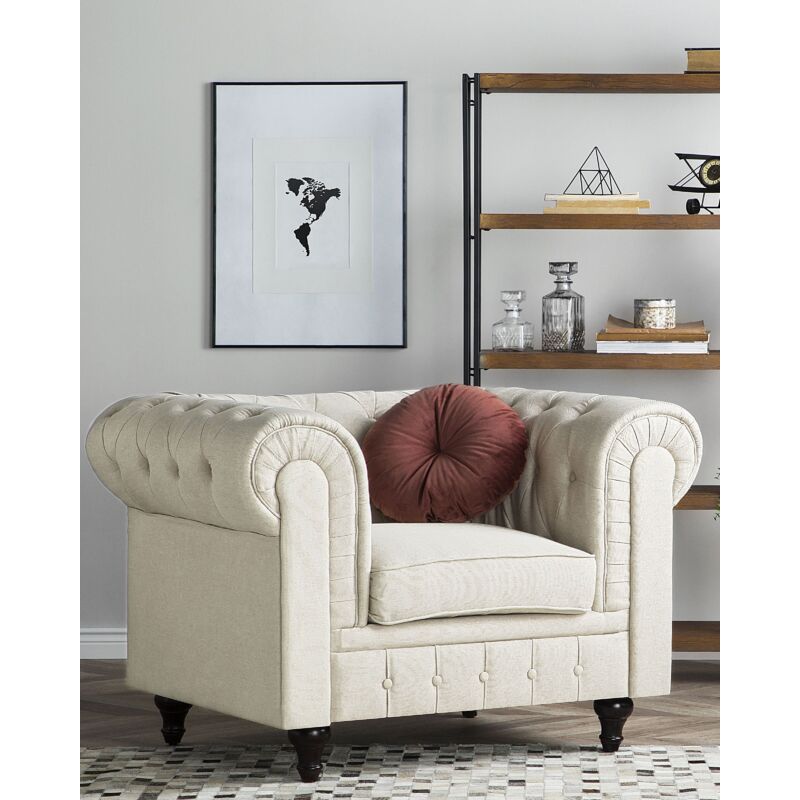Fauteuil au style chesterfield en tissu beige Fauteuil au style chesterfield en tissu beige