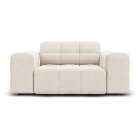 Fauteuil en velours beige clair