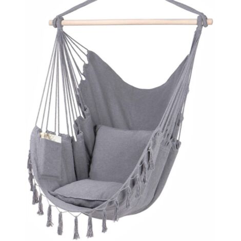fauteuil hamac suspendu en coton pour jardin et terrasse exterieur couleur gris clair avec barres en bois et deux coussins
