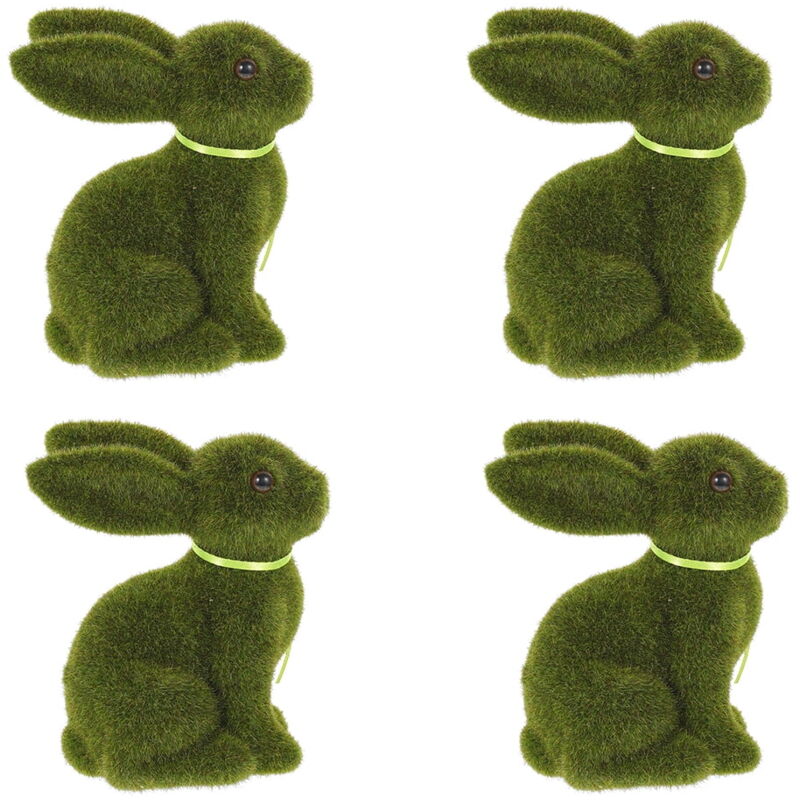 Figurines de lapin de Pâques avec mousse et herbe pour la décoration printanière