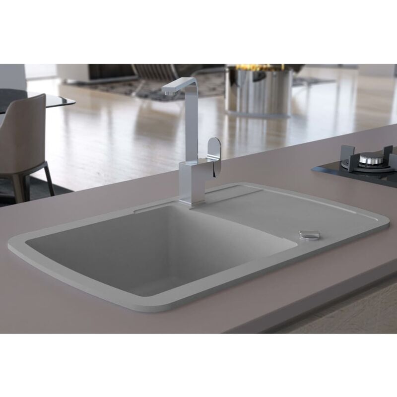 

Fregadero de cocina con un seno de granito gris