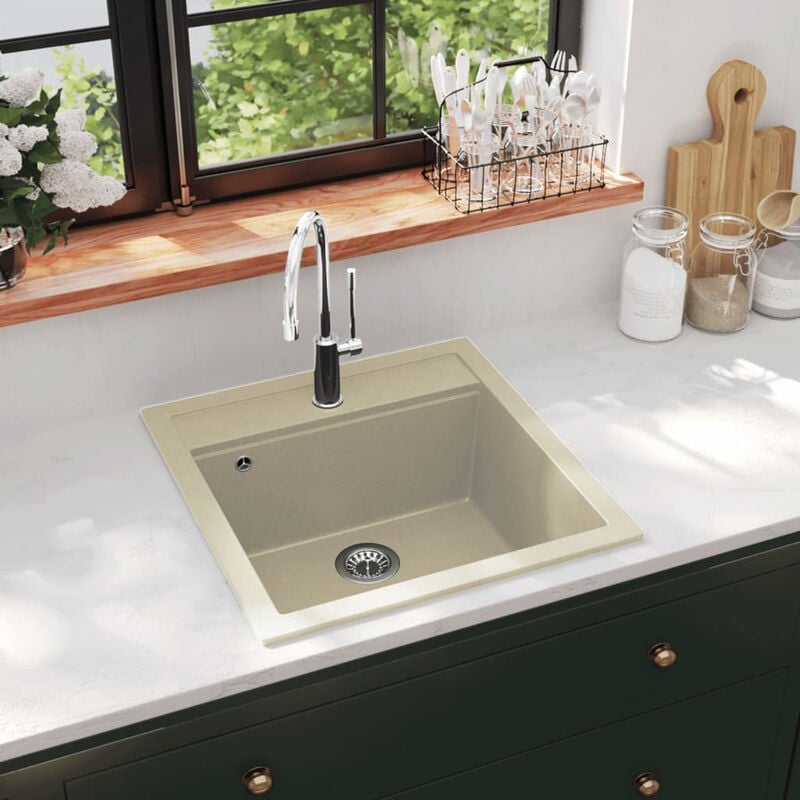

Fregadero de cocina de granito con un seno beige