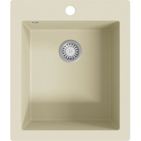 Fregadero de cocina de granito con un seno beige