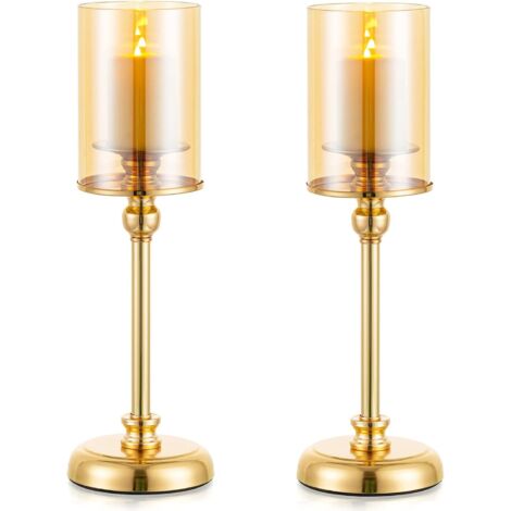 goldene Windlichter, hohe goldene Kerzenhalter aus Metall