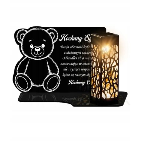 Grande bougie solaire LED en forme d'ours en peluche pour un enfant sur une tombe le jour de la Toussaint