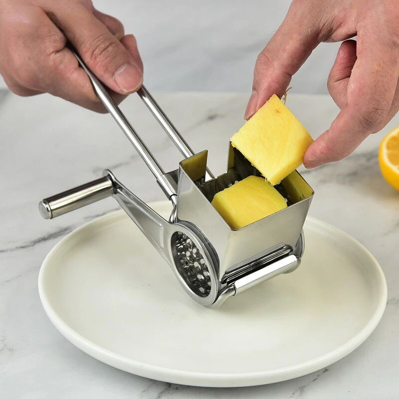Image of Grattugia per formaggio in acciaio inox, manovella, lame rotanti, tritaverdure, cucina