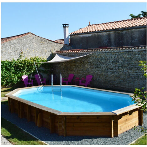 GRE – Piscine hors sol en bois traité autoclave IV – Ovale 6,56m x 4,56m x H: 1,31m – Volume 24,7m³ – Surface de nage 21,9m²