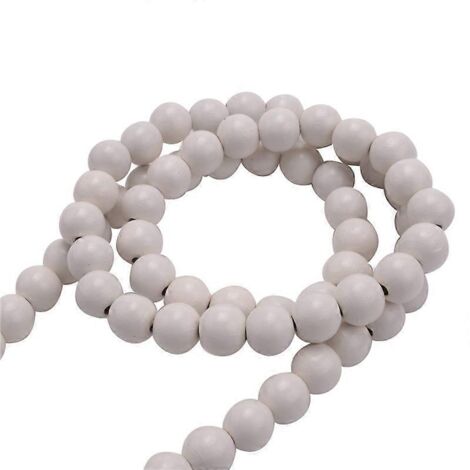 Guirlande de perles en bois avec pompons, style rustique, couleur bois.