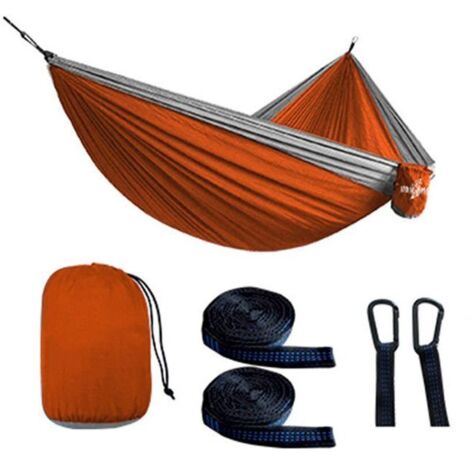 Hamac de camping ultra-portable, idéal pour les vacances en plein air, les sorties en famille et les séjours au parc.