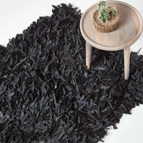 HOMESCAPES Dallas Leather Shaggy Rug Black, 90 x 150 cm