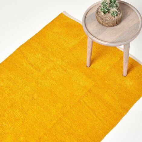 HOMESCAPES Tapis Chenille uni en 100% coton Jaune moutarde - 110 x 170 cm