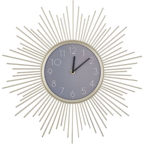 Horloge au Style Industriel en Acier Doré et en Forme de Soleil Décoratif et Moderne pour Salon ou Salle à Manger ou Cuisine Beliani - Doré
