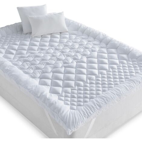 Idmarket – Surmatelas 140x190 cm 7 zones de confort – Épais et moelleux 600 gr – Enveloppe polyester – Compatible avec lits standard
