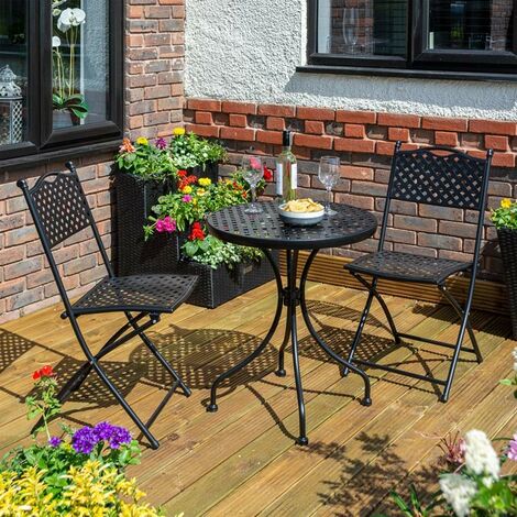 Patio iron deals table and chairs