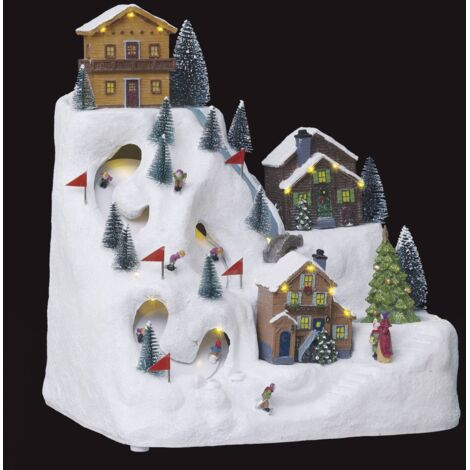 Pueblo iluminado pista de esquí y chalet 24 LED H.34,5cm musical  - Feeric lights & christmas
