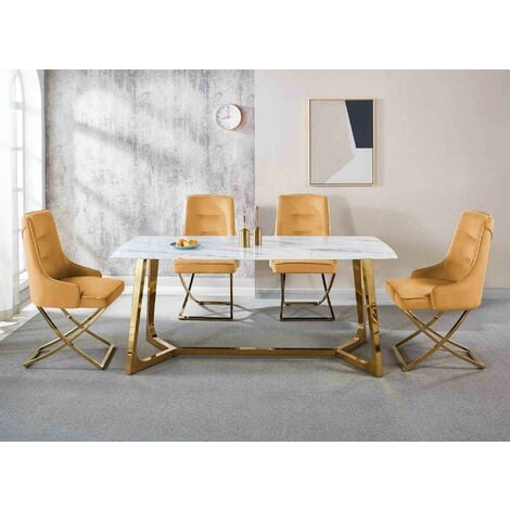 Table à manger avec pieds dorés et plateau céramique aspect marbre