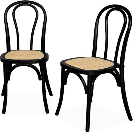 Lot de deux chaises vintage en bois avec assise en rotin et dossier arrondi coloris noir (1/2)