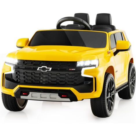 GOPLUS Véhicule Electrique Enfants 12V, SUV Chevrolet Tahoe pour Enfants de 3-8Ans avec Télécommande 2,4 G, Suspension à Ressort, Lumières, Musique, Démarrage Lent, Charge 25KG (Jaune) (1/5)