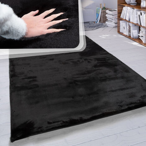 Kunstfell Teppich Kuhmuster schwarz/weiß Überwurf Webpelz Fellform 90 cm  Nambung