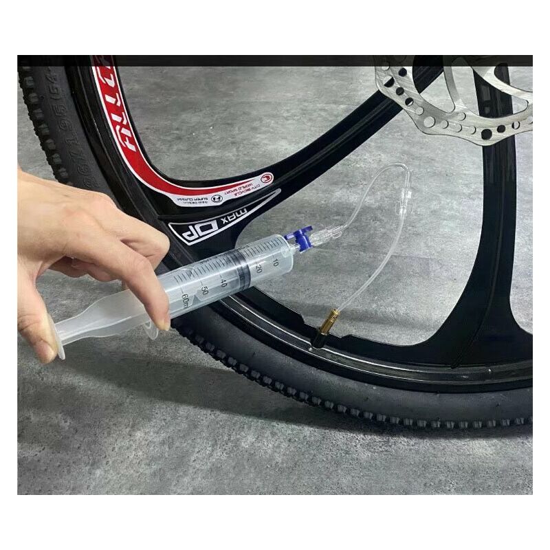 Kit de remplissage de pneu de vélo Injecteur de mastic de vélo Tubeless  Capacité de 50 ml Kit de remplissage de pneu sous vide de vélo universel  pour