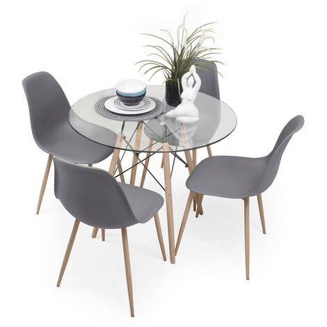 Mesa de comedor de cristal y cuatro sillas estilo nórdico