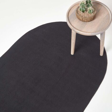 HOMESCAPES Black Handmade Woven Braided Oval Rug, 90 x 150 cm