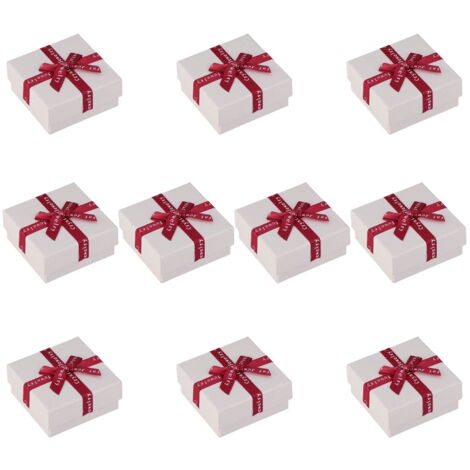 Boîte cadeau blanche avec un nœud rouge présent de célébration surprise