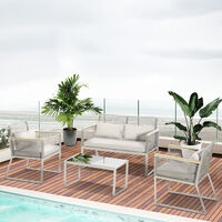 Ensemble salon de jardin design contemporain style yachting 4 places accoudoirs bois coussins inclus table basse métal époxy résine tressée gris