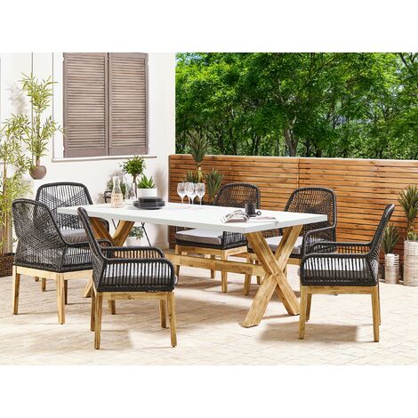 Outdoor Garden Dining Set Concrete Table 6 Wicker Chairs White and Black Olbia