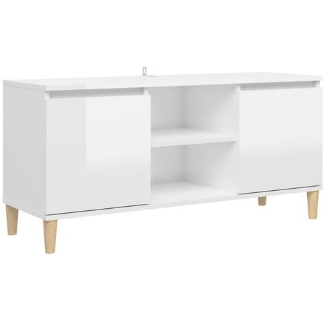 Armoire télévisée avec des jambes en bois clair équipées de 2 portes et de divers compartiments de couleurs Couleur : Blanc brillant