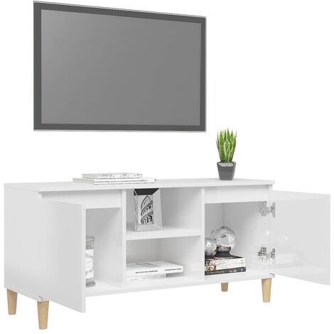 Armoire télévisée avec des jambes en bois clair équipées de 2 portes et de divers compartiments de couleurs Couleur : Blanc brillant
