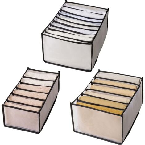 Caja organizadora para los tornillos y tacos sobre fondo blanco de