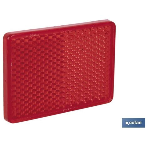 Catadióptrico adhesivo rojo 56 x 39 mm, resistente y homologado para vehículos.