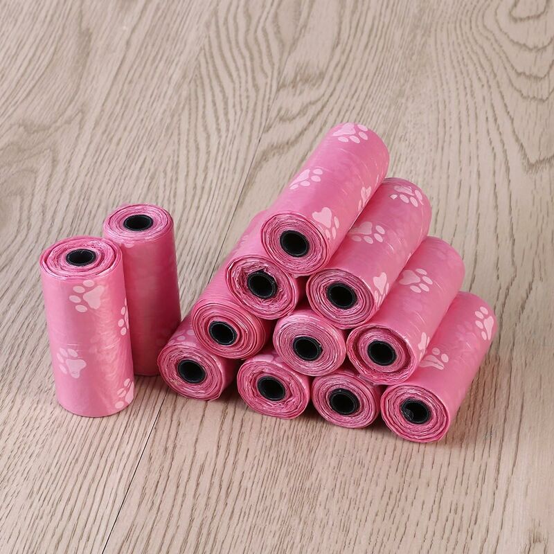 Confezione da 4 rotoli di sacchetti per cacca di cane 4x20 al profumo di  rosa Trixie - Altri Sport