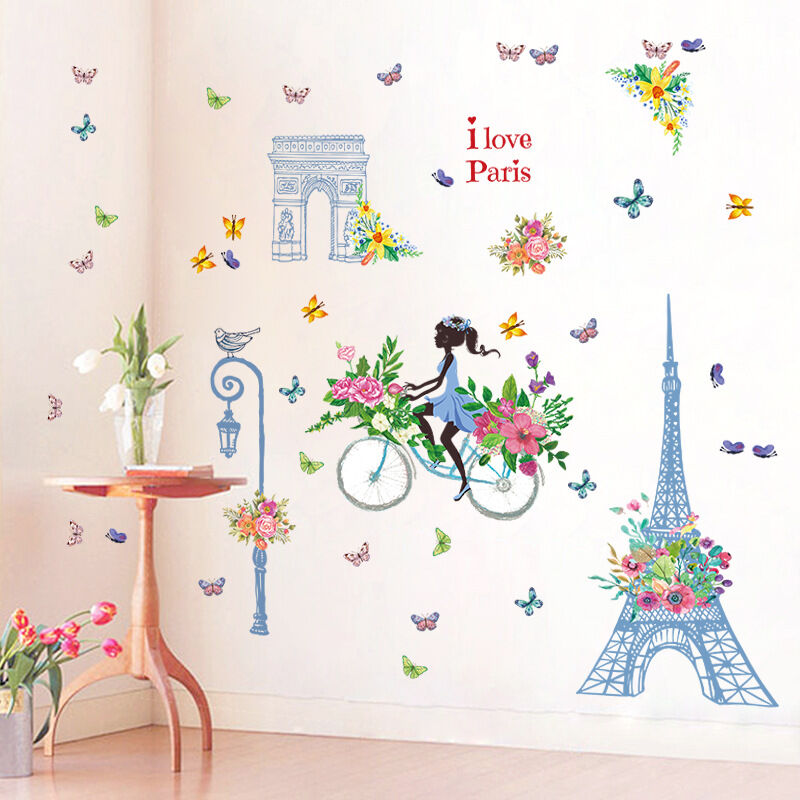 Un lot de Stickers Muraux fille en vélo fleurs papillons Paris