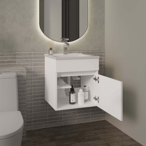 Belle meuble de salle de bain suspendu avec lavabo et une porte (1/5)