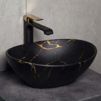 Lavabo da appoggio ovale in ceramica TANDILA nero opaco marmorizzato con venature dorate.