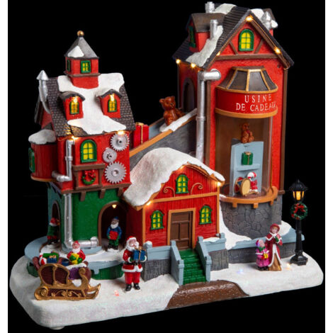 Fééric Lights And Christmas – Village de Noël lumineux animé musical en polyresine – Usine de cadeaux éclairage LED multicolore – Dimensions 31,5x16,5x27,5cm – Poids 2kg
