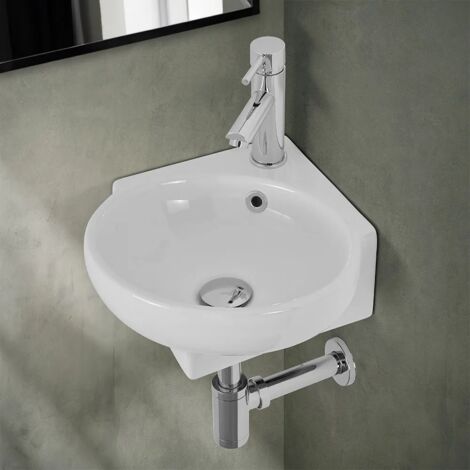 Lavabo sospeso ad angolo 39x36 in ceramica lucida con design ovale (1/5)