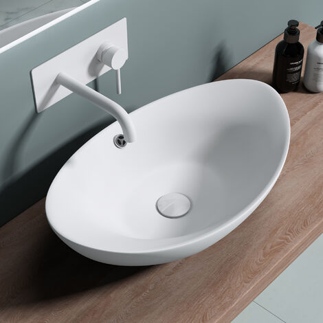 doporro® Lavabo ovalado de baño 59x38x19cm Brüssel818 Lavabo sobre encimera de cerámica en color blanco mate con nano revestimiento