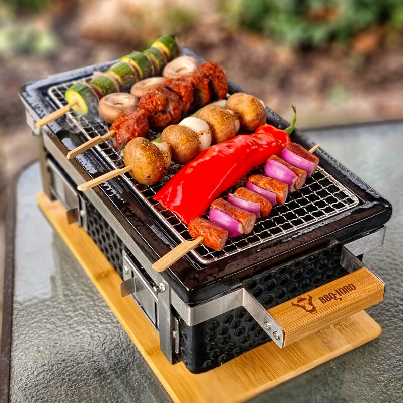 Barbecue portatile Mini pieghevole griglia a carbone bbq grill smontabile  da tavolo grill 35 x 27 x 19,5 cm per giardino, balcone, viaggio, campeggio  - nero