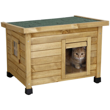 Casa para gatos Kerbl Rustica (casa para gatos de madera con techo verde, puerta batiente con láminas, ventana de plexiglás, patas de plástico de altura regulable, dimensiones 57 x 45 x 43) 81564