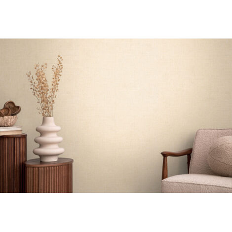 Papier peint intissé uni aux tons beige et jaune - 10,05 x 0,53 m - collection Cosmopolitan (1/5)