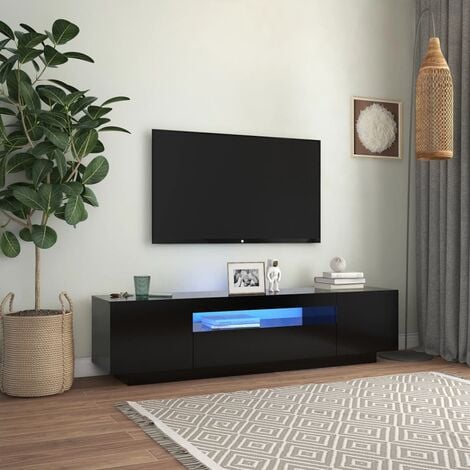 Una sala de estar con una pared que tiene una luz led que tiene una imagen  de un televisor.