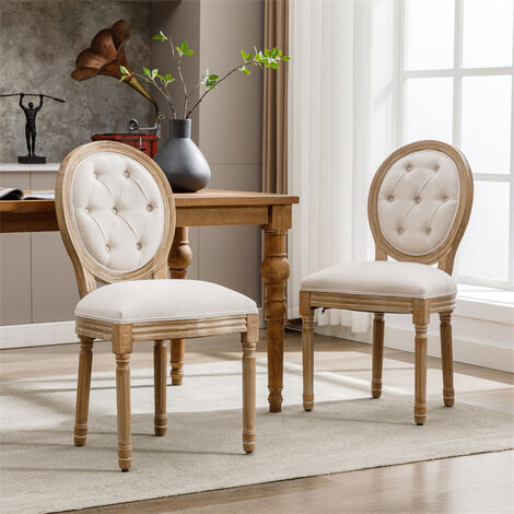 Set de deux belles chaises Bradley avec son piètement en métal noir, assise  velours blanc nacré style années 50